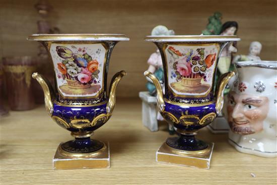 A small group of ceramics, including a pair of Derby style cobalt blue campana urns